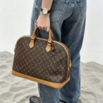 LV Alma Voyage MM Bag Brown Monogram Coated Canvas with Leather and Gold Hardware #ROYE-3 - Image 34