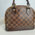 LV Alma BB Damier Ebene Coated Canvas with Leather and Gold Hardware #GUUKT-1 - Image 3